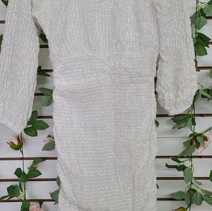 White dress. Size M. Zipper in the side